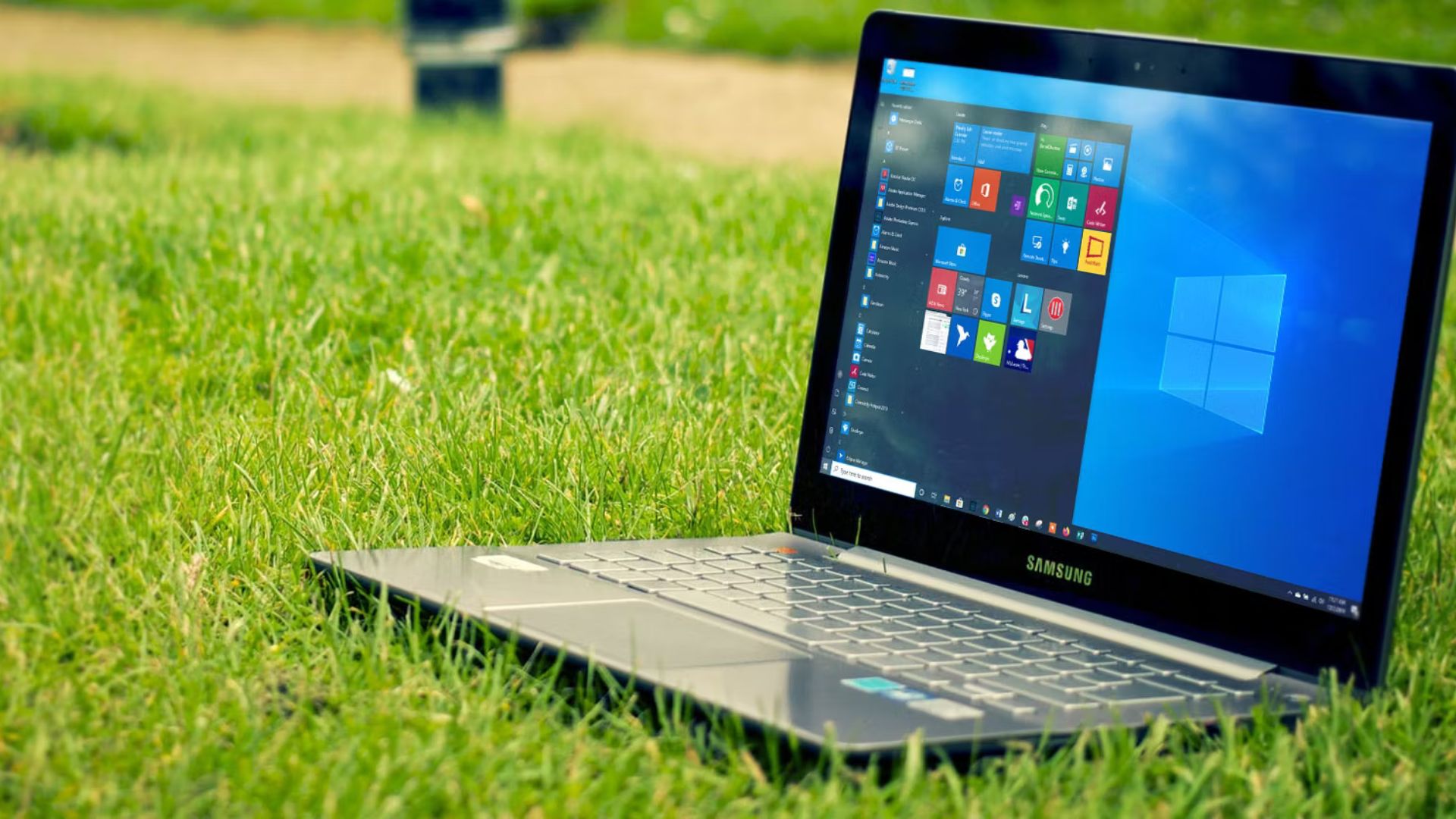 a laptop on a greenly lawn